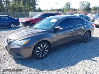 2017 Nissan Altima 2.5 SR with VIN 1N4AL3AP8HC180059, listed as a IAAI auction lot 42075133 with 197,955 mi miles. Bid and sale history available at carsss.com. Image 2.