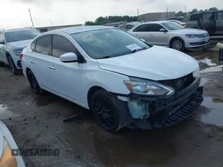 2018 Nissan Sentra S z VIN 3N1AB7AP6JY240649, wystawiony jako IAAI lot #42123511 z przebiegiem 132 478 mil mil oraz . Historia ofert i sprzedaży dostępna na DreamBid. Obrazek 1.