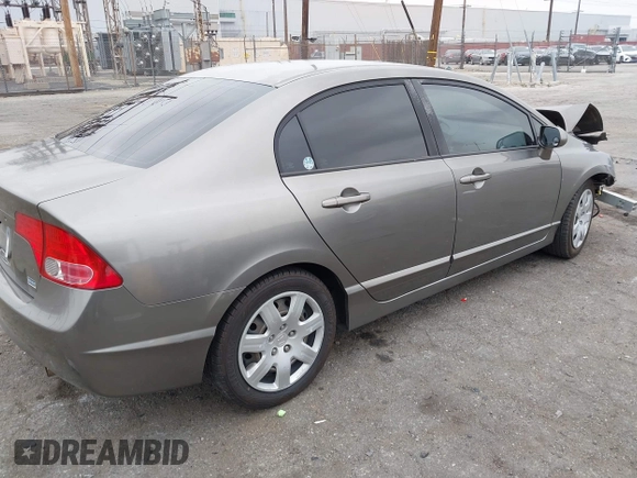 2006 Honda Civic LX with VIN 2HGFA16586H507296, listed as a IAAI auction lot 42101001 with 144,781 mi miles and . Bid and sale history available at DreamBid. Image 4.