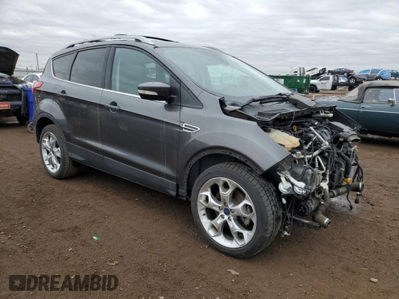 2015 Ford Escape Titanium with VIN 1FMCU9J90FUA08275, listed as a Copart auction lot 52431655 with 141,562 mi miles and Salvage Title. Bid and sale history available at carsss.com. Image 4.