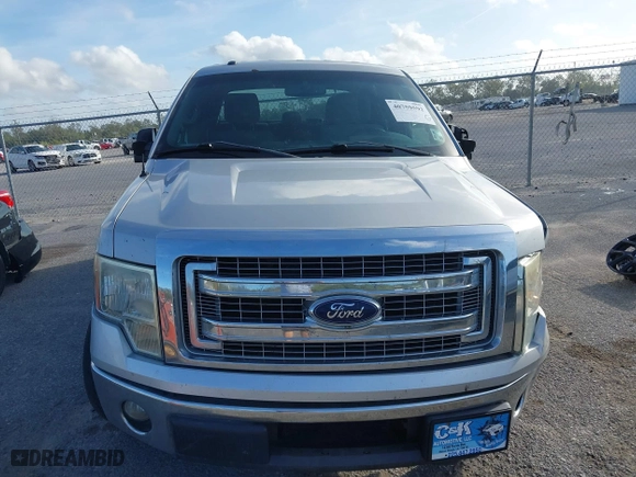2013 Ford F-150 XL with VIN 1FTFW1CT9DKD02756, listed as a IAAI auction lot 40759592 with 218,975 mi miles. Bid and sale history available at carsss.com. Image 12.