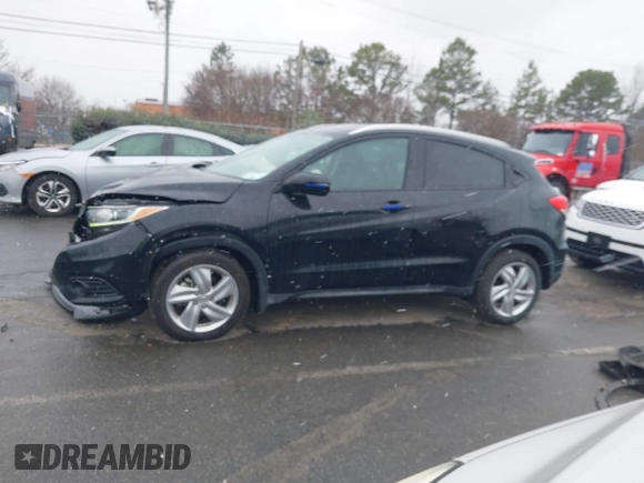 2019 Honda HR-V EX with VIN 3CZRU5H52KM704011, listed as a IAAI auction lot 41616517 with 57,921 mi miles. Bid and sale history available at carsss.com. Image 14.