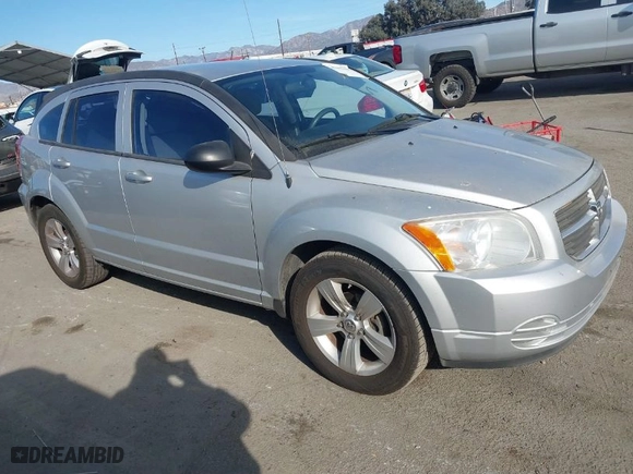 2010 Dodge Caliber SXT with VIN 1B3CB4HA3AD664526, listed as a IAAI auction lot 41401694 with 215,104 mi miles. Bid and sale history available at carsss.com. Image 1.