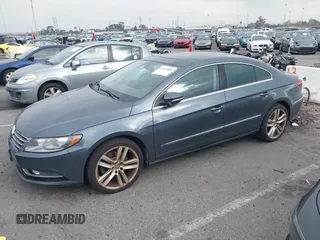 2013 Volkswagen CC Lux with VIN WVWRP7AN8DE507811, listed as a IAAI auction lot 41447468 with 147,162 mi miles. Bid and sale history available at carsss.com. Image 2.
