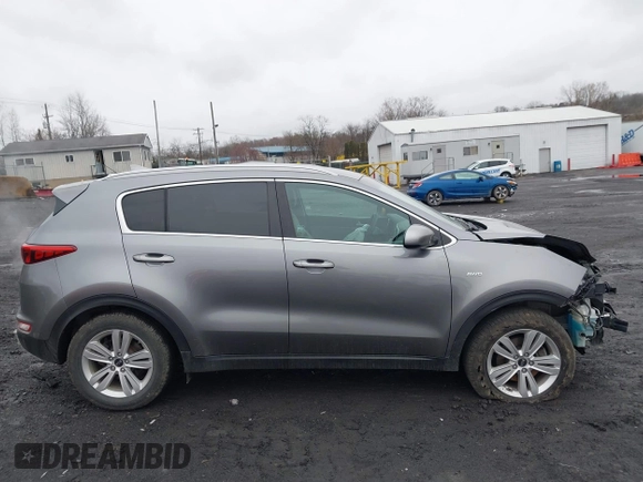 2017 Kia Sportage LX with VIN KNDPMCAC2H7238741, listed as a IAAI auction lot 41973333 with 64,714 mi miles and . Bid and sale history available at carsss.com. Image 13.