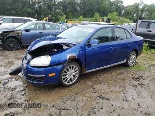 2009 Volkswagen Jetta with VIN 3VWHZ71K39M034958, listed as a Copart auction lot 63974185 with 188,871 mi miles and Clean title. Bid and sale history available at DreamBid. Image 1.