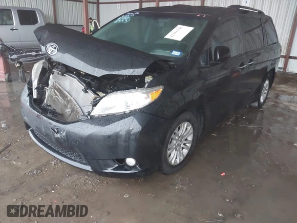 2016 Toyota Sienna XLE with VIN 5TDYK3DC0GS701583, listed as a IAAI auction lot 42155548 with 187,700 mi miles and . Bid and sale history available at DreamBid. Image 2.