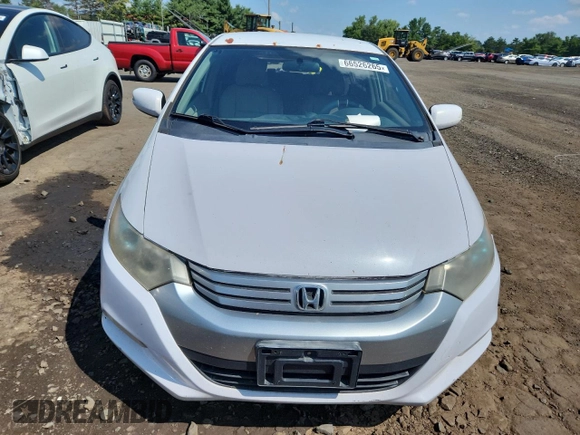 2010 Honda Insight EX с VIN JHMZE2H75AS024918, выставлен на аукционе Copart как лот 66526265 с пробегом 312 605 миль миль и Списание • Salvage title. История ставок и продаж доступна на DreamBid. Изображение 5.