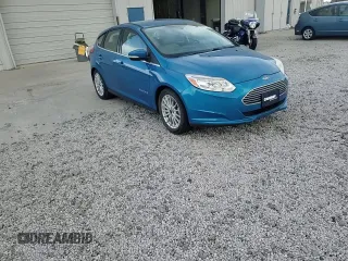 2014 Ford Focus Electric z VIN 1FADP3R41EL341620, wystawiony jako Copart lot #87277454 z przebiegiem 67 589 mil mil oraz Szkody całkowita. Historia ofert i sprzedaży dostępna na DreamBid. Obrazek 11.