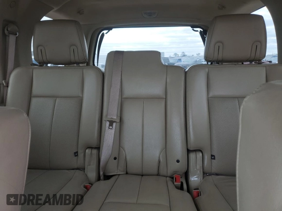 2011 Ford Expedition XLT with VIN 1FMJU1H52BEF47545, listed as a Copart auction lot 52987825 with 127,500 mi miles and Salvage title. Bid and sale history available at DreamBid. Image 10.
