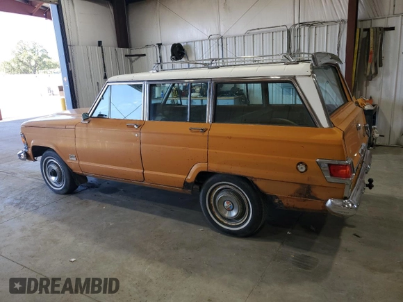 1972 Jeep Grand Wagoneer with VIN J2A144CN29869, listed as a Copart auction lot 73240394 with 83,806 mi miles and Clean title. Bid and sale history available at DreamBid. Image 2.