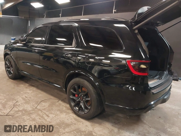2023 Dodge Durango R/T Plus with VIN 1C4SDJCT8PC571642, listed as a IAAI auction lot 42093743 with 33,631 mi miles and . Bid and sale history available at DreamBid. Image 3.