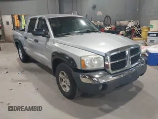 2005 Dodge Dakota SLT with VIN 1D7HW48N25S253766, listed as a IAAI auction lot 42591384 with 154,426 mi miles and . Bid and sale history available at DreamBid. Image 1.