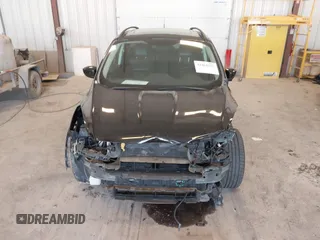 2014 Ford Escape SE with VIN 1FMCU9G95EUA16328, listed as a IAAI auction lot 42464235 with 108,570 mi miles and . Bid and sale history available at DreamBid. Image 12.