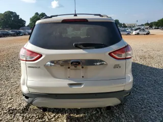2013 Ford Escape SEL with VIN 1FMCU9H99DUA02767, listed as a Copart auction lot 63341945 with 130,245 mi miles and Clean title. Bid and sale history available at DreamBid. Image 6.