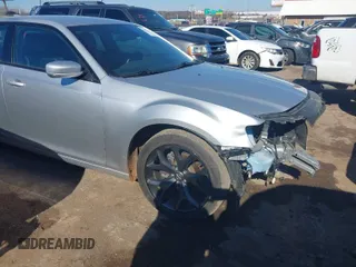 2021 Chrysler 300 with VIN 2C3CCABG2MH524079, listed as a IAAI auction lot 41296881 with 77,463 mi miles. Bid and sale history available at carsss.com. Image 1.