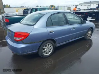 2003 Kia Rio with VIN KNADC125736227286, listed as a IAAI auction lot 41928174 with 151,431 mi miles. Bid and sale history available at carsss.com. Image 4.