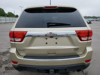 2011 Jeep Grand Cherokee Limited z VIN 1J4RR5GG1BC557900, wystawiony jako Copart lot #57858005 z przebiegiem 117 360 mil mil oraz Czysty tytuł • Clean title. Historia ofert i sprzedaży dostępna na DreamBid. Obrazek 6.