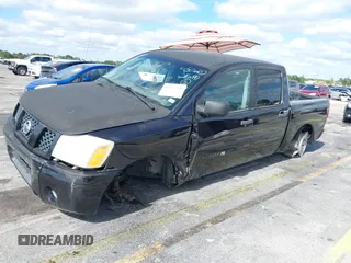 2005 Nissan Titan SE with VIN 1N6AA07A05N501283, listed as a IAAI auction lot 39151799 with 129,069 mi miles and . Bid and sale history available at DreamBid. Image 6.