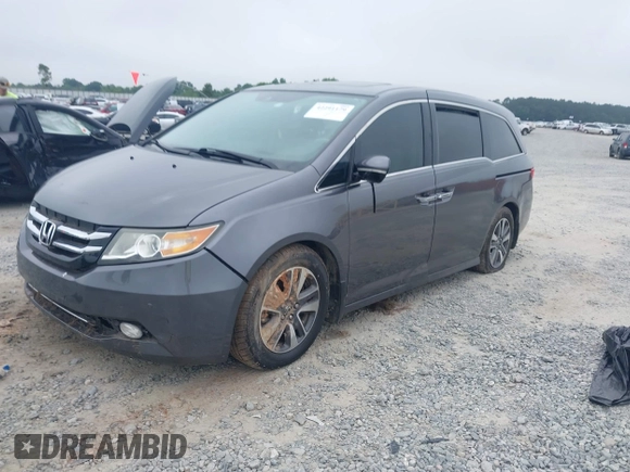 2014 Honda Odyssey Touring with VIN 5FNRL5H98EB008953, listed as a IAAI auction lot 42291179 with Not provided miles and . Bid and sale history available at DreamBid. Image 16.
