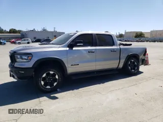2022 Ram 1500 Rebel with VIN 1C6SRFLT5NN199975, listed as a Copart auction lot 57791465 with 46,796 mi miles and Salvage title. Bid and sale history available at DreamBid. Image 1.