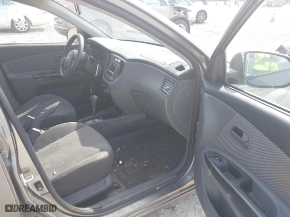 2011 Kia Rio LX with VIN KNADH4A39B6923388, listed as a IAAI auction lot 42060176 with 98,690 mi miles. Bid and sale history available at carsss.com. Image 5.