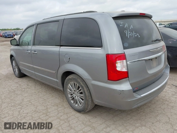 2013 Chrysler Town & Country Touring L with VIN 2C4RC1CG7DR779762, listed as a IAAI auction lot 42118866 with 151,833 mi miles and . Bid and sale history available at DreamBid. Image 3.