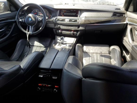 2016 BMW M5 with VIN WBSFV9C57GG343387, listed as a Copart auction lot 73416564 with 71,131 mi miles and Salvage Title. Bid and sale history available at carsss.com. Image 8.