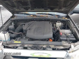 2015 Toyota Tacoma with VIN 3TMLU4EN1FM201554, listed as a IAAI auction lot 42008012 with 118,313 mi miles and . Bid and sale history available at DreamBid. Image 10.