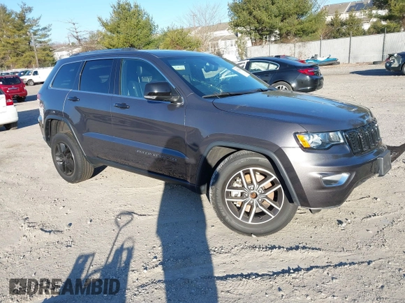 2021 Jeep Grand Cherokee 80th Anniversary z VIN 1C4RJFBG5MC737412, wystawiony jako IAAI lot #41753550 z przebiegiem 54 921 mil mil oraz . Historia ofert i sprzedaży dostępna na DreamBid. Obrazek 1.