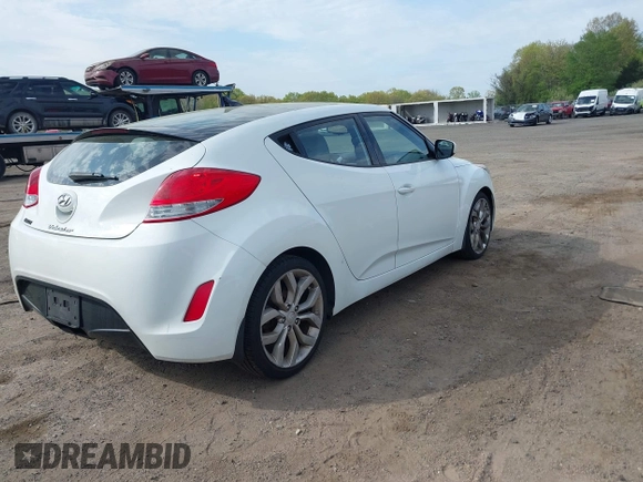 2012 Hyundai Veloster w/Gray Int z VIN KMHTC6AD6CU063301, wystawiony jako IAAI lot #42142593 z przebiegiem 100 796 mil mil oraz . Historia ofert i sprzedaży dostępna na DreamBid. Obrazek 4.