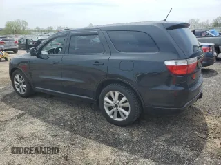 2012 Dodge Durango R/T with VIN 1C4SDJCT8CC301577, listed as a Copart auction lot 55934735 with 127,691 mi miles and Salvage title. Bid and sale history available at DreamBid. Image 2.