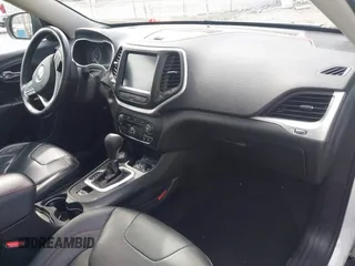 2014 Jeep Cherokee Trailhawk with VIN 1C4PJMBS5EW240375, listed as a IAAI auction lot 41806725 with 127,705 mi miles. Bid and sale history available at carsss.com. Image 5.