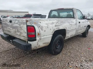 1996 Dodge Ram 1500 Work Special with VIN 1B7HC16X8TS611634, listed as a IAAI auction lot 41585210 with 311,707 mi miles. Bid and sale history available at carsss.com. Image 4.