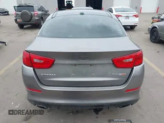 2014 Kia Optima SXL Turbo with VIN 5XXGR4A69EG312273, listed as a IAAI auction lot 41729863 with 107,660 mi miles and . Bid and sale history available at DreamBid. Image 16.