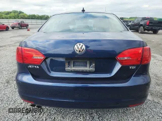 2014 Volkswagen Jetta TDI w/Premium/Nav z VIN 3VWLL7AJ8EM284760, wystawiony jako Copart lot #56986005 z przebiegiem 48 253 mil mil oraz Szkoda całkowita • Salvage title. Historia ofert i sprzedaży dostępna na DreamBid. Obrazek 6.
