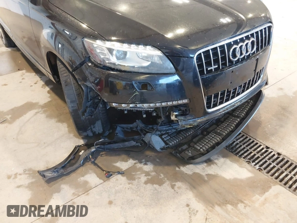 2013 Audi Q7 3.0T Premium Plus with VIN WA1LGAFE8DD003853, listed as a IAAI auction lot 40675011 with 104,517 mi miles. Bid and sale history available at carsss.com. Image 6.