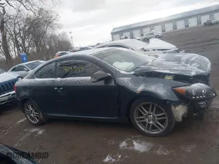 2005 Scion tC with VIN JTKDE177X50044793, listed as a IAAI auction lot 41735187 with 186,658 mi miles. Bid and sale history available at carsss.com. Image 14.