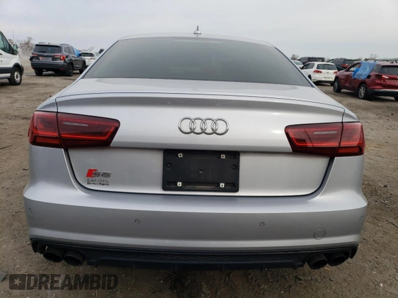 2016 Audi S6 Prestige z VIN WAUH2AFC0GN071830, wystawiony jako Copart lot #81327524 z przebiegiem 108 386 mil mil oraz Szkody całkowita. Historia ofert i sprzedaży dostępna na DreamBid. Obrazek 6.