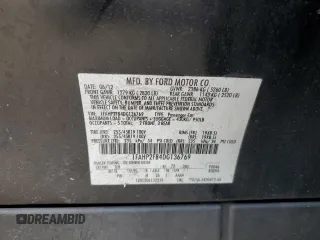 2013 Ford Taurus Limited with VIN 1FAHP2F84DG136769, listed as a Copart auction lot 60990765 with 228,994 mi miles and Salvage title. Bid and sale history available at DreamBid. Image 12.
