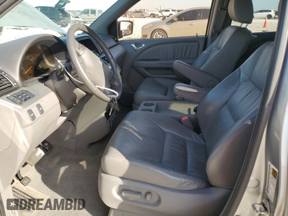 2009 Honda Odyssey EX-L with VIN 5FNRL38799B034292, listed as a Copart auction lot 52547205 with 116,658 mi miles and Salvage Title. Bid and sale history available at DreamBid. Image 7.