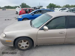 2000 Chevrolet Malibu LS with VIN 1G1NE52J1Y6165986, listed as a IAAI auction lot 42119874 with 118,073 mi miles. Bid and sale history available at carsss.com. Image 15.