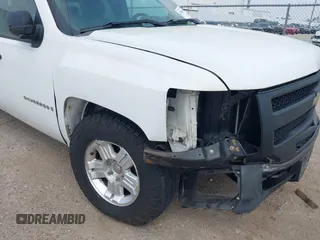 2009 Chevrolet Silverado 1500 Work Truck with VIN 1GCEK19069Z173281, listed as a IAAI auction lot 41786113 with 157,498 mi miles. Bid and sale history available at carsss.com. Image 6.