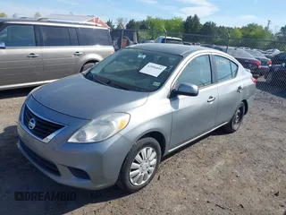 2014 Nissan Versa SV with VIN 3N1CN7AP5EL809218, listed as a IAAI auction lot 42096891 with 87,559 mi miles. Bid and sale history available at carsss.com. Image 2.
