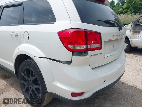 2014 Dodge Journey SXT z VIN 3C4PDCBBXET135001, wystawiony jako IAAI lot #42318360 z przebiegiem 152 321 mil mil oraz . Historia ofert i sprzedaży dostępna na DreamBid. Obrazek 13.