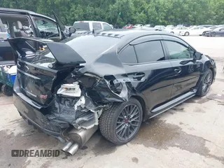 2015 Subaru WRX STI with VIN JF1VA2P63F9832130, listed as a IAAI auction lot 42493621 with 89,000 mi miles and . Bid and sale history available at DreamBid. Image 4.