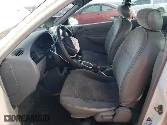 1998 Ford Escort LX z VIN 1FAFP10P1WW160215, wystawiony jako Copart lot #86325684 z przebiegiem 155 577 mil mil oraz Szkody całkowita. Historia ofert i sprzedaży dostępna na DreamBid. Obrazek 7.