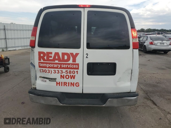 2014 Chevrolet Express Passenger LT with VIN 1GAZG1FGXE1157798, listed as a Copart auction lot 64301595 with 272,982 mi miles and Clean title. Bid and sale history available at DreamBid. Image 6.