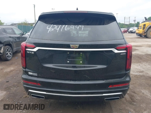 2020 Cadillac XT6 FWD Premium Luxury z VIN 1GYKPCRS6LZ148058, wystawiony jako IAAI lot #42416949 z przebiegiem 79 318 mil mil oraz . Historia ofert i sprzedaży dostępna na DreamBid. Obrazek 16.