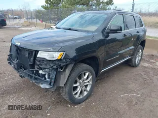 2015 Jeep Grand Cherokee Summit with VIN 1C4RJFJGXFC882787, listed as a IAAI auction lot 42098274 with 147,020 mi miles and . Bid and sale history available at DreamBid. Image 2.